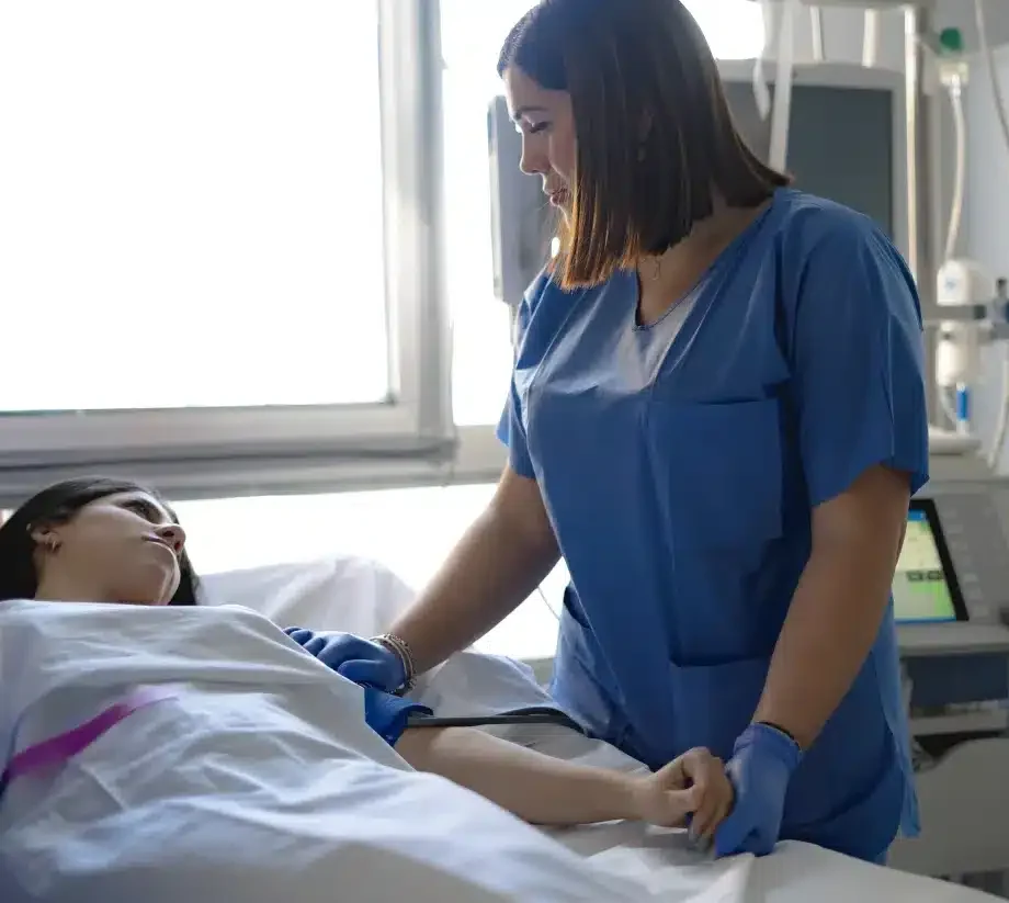 nurse-checking-blood-pressure-of-patient-in-hospit-2026-03-25-06-33-39-utc